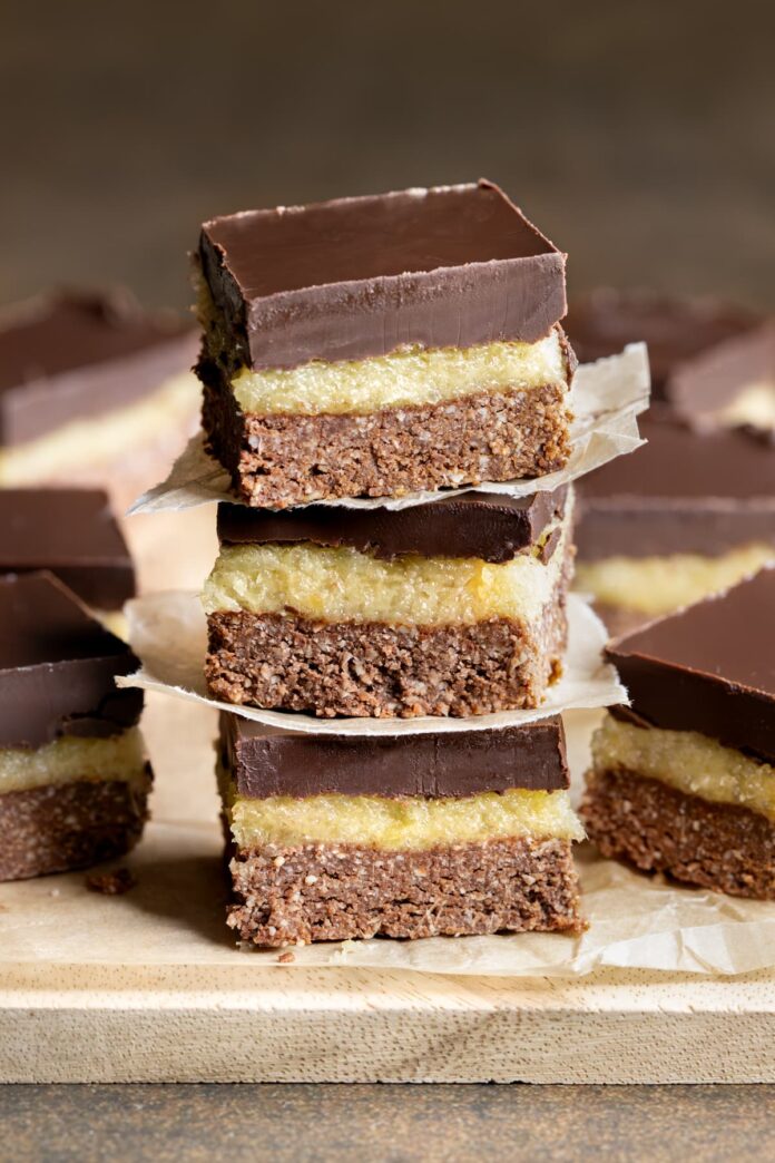 Pieces of dark chocolate ginger slice stacked up