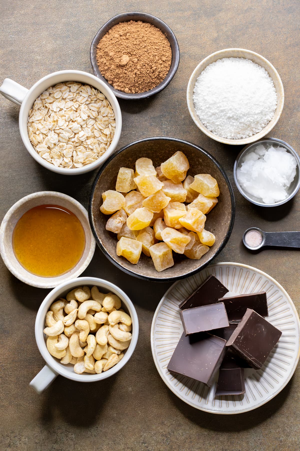 Ingredients for dark chocolate ginger slice arranged in bowls