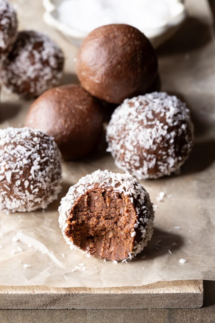 Vegan chocolate mint protein balls on a sheet of baking paper