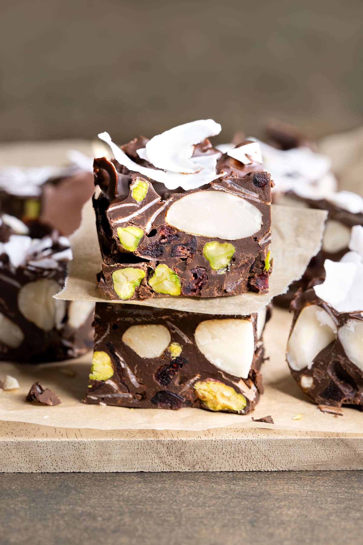 Pieces of vegan rocky road separated by baking paper