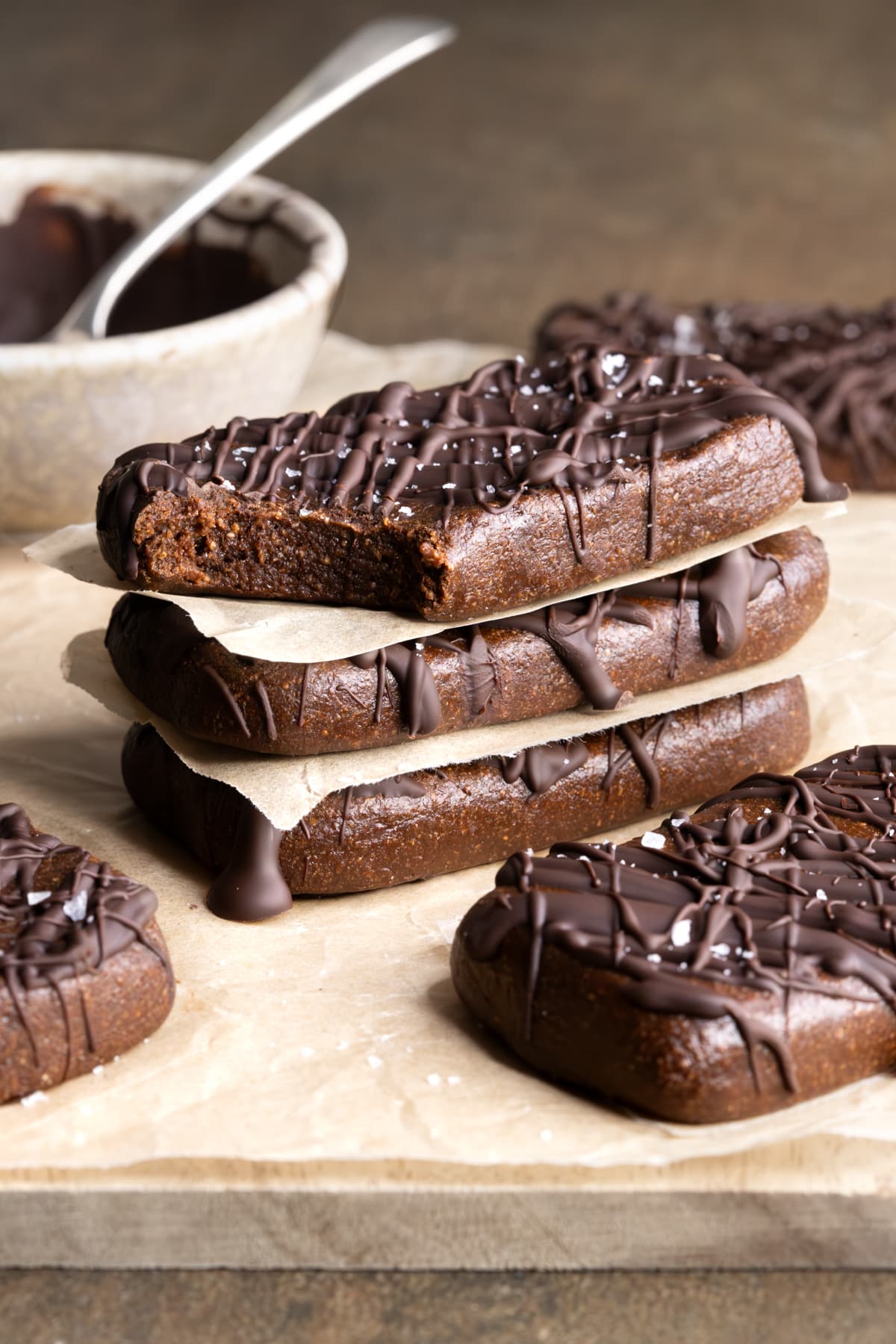 Chocolate protein bars with whey protein powder separated with baking paper