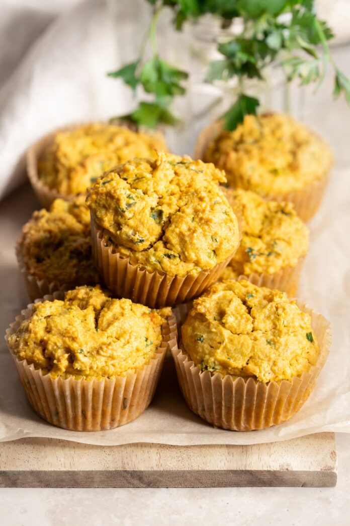 Gluten-free savory sweet potato muffins stacked on top of each other