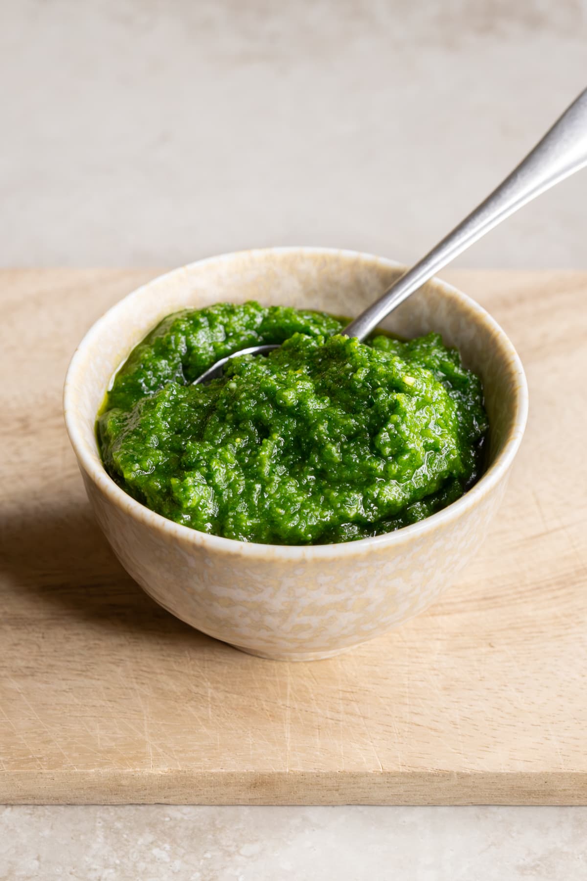 Parsley pine nut pesto sauce served in a bowl