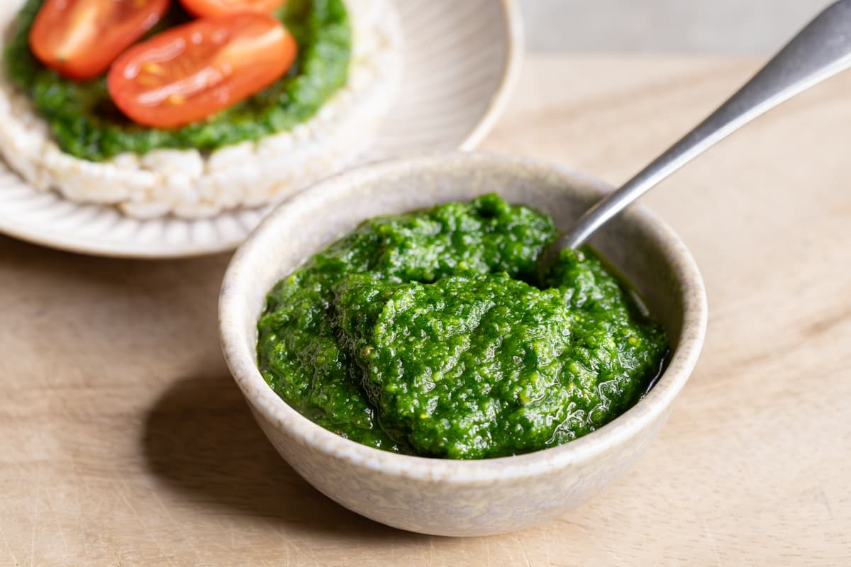 Pesto made with parsley and pine nuts in a bowl