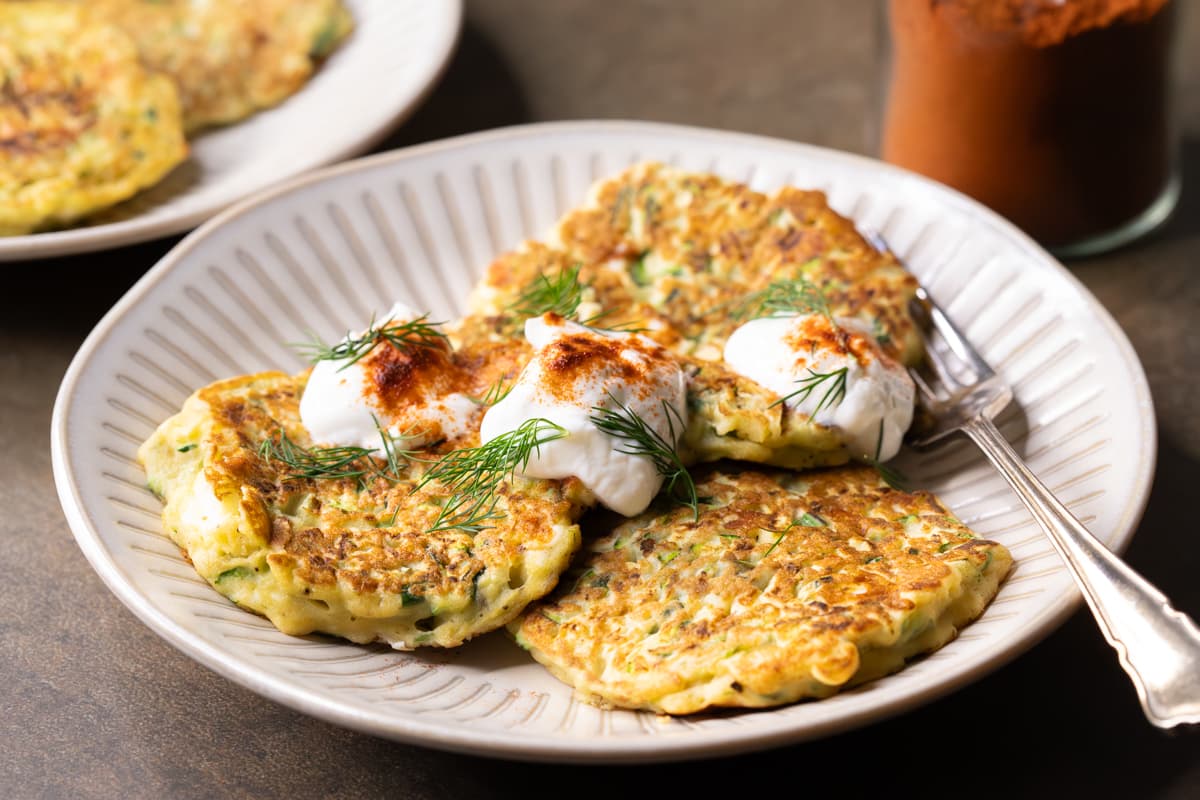 Gluten-free zucchini feta fritters served on a plate