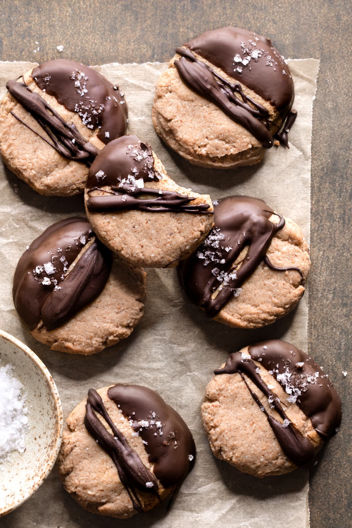 Vegan almond olive oil shortbread cookies on a sheet of baking paper