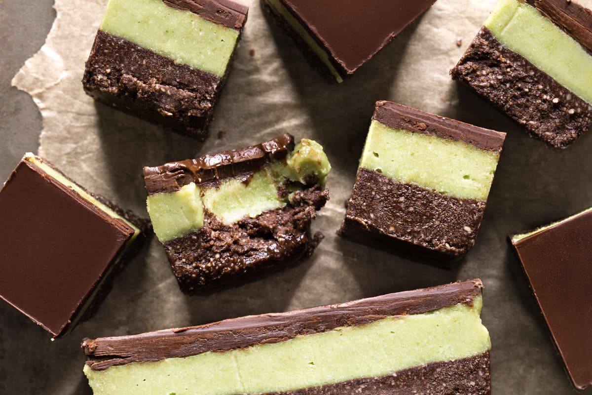 Squares of vegan no-bake chocolate mint slice