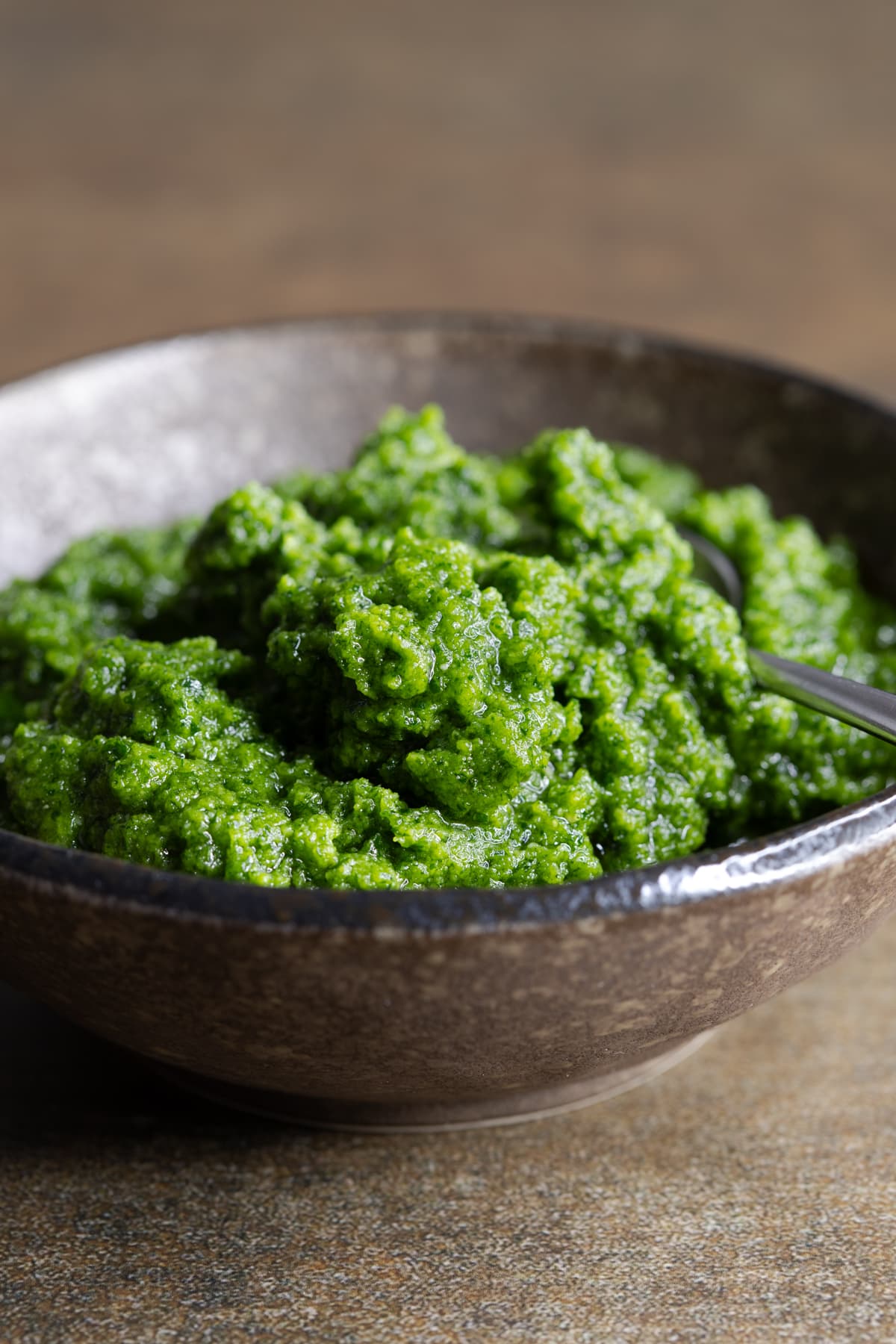 Parsley pesto sauce with cashew nuts served in a bowl