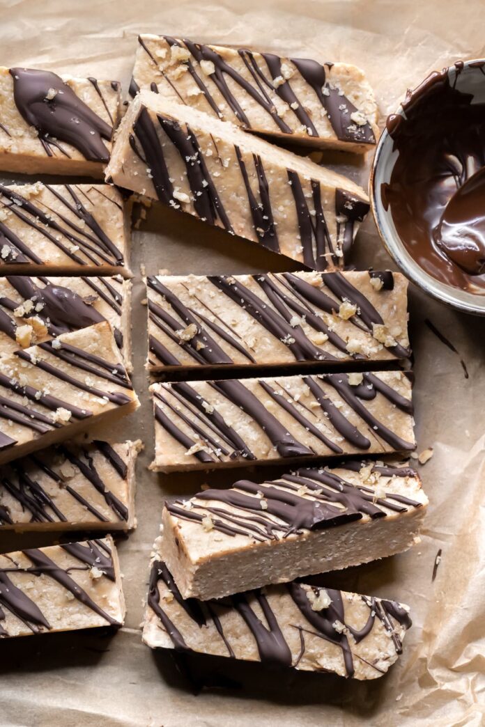 Peanut butter oat protein bars with dark chocolate drizzle