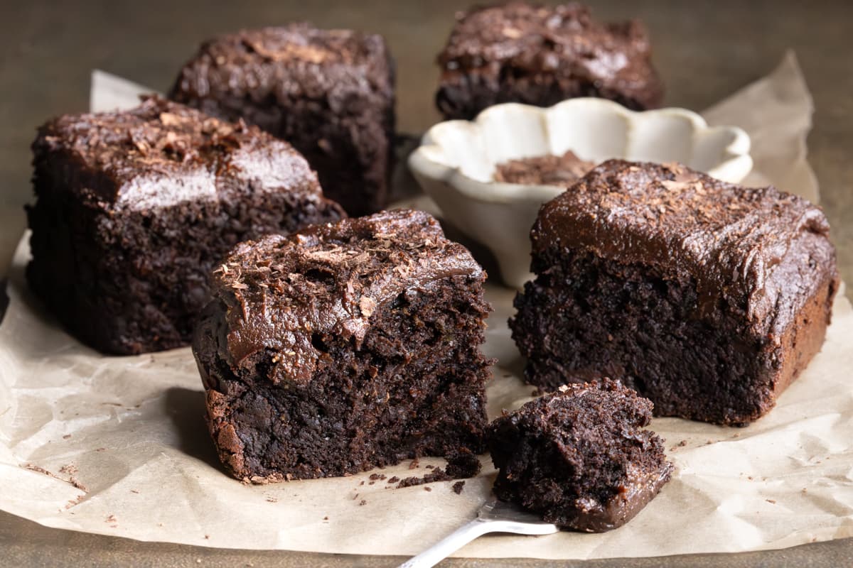 Zucchini brownies topped with chocolate frosting