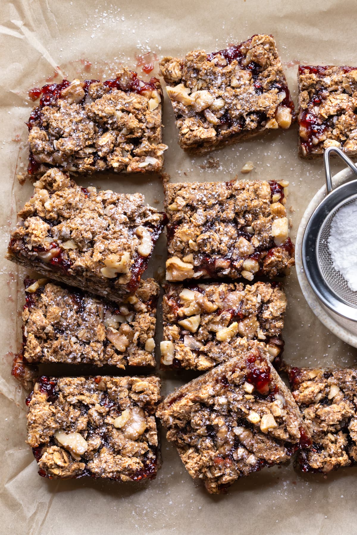 A batch of oatmeal bars with jam and walnuts