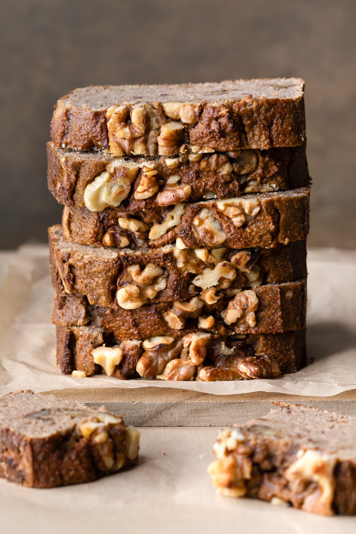 A stack of banana bread slices with walnuts