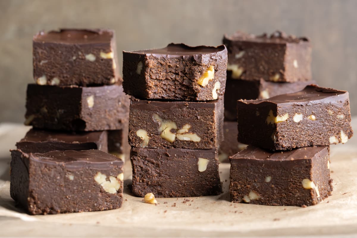 No-bake brownies with walnuts arranged in stacks