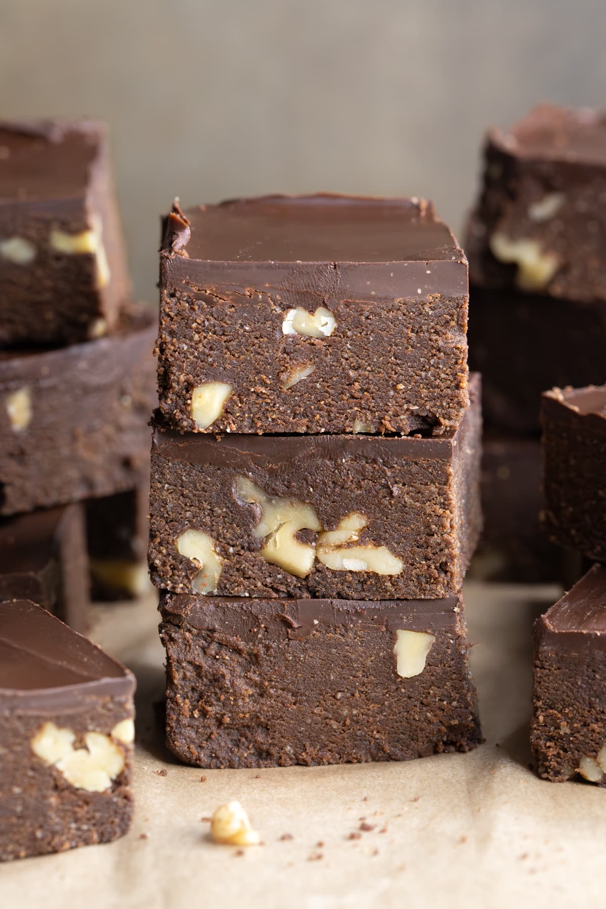 A stack of brownies with walnuts